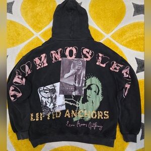 Lifted Anchors Black and pink streetwear hoodie with unique back design.